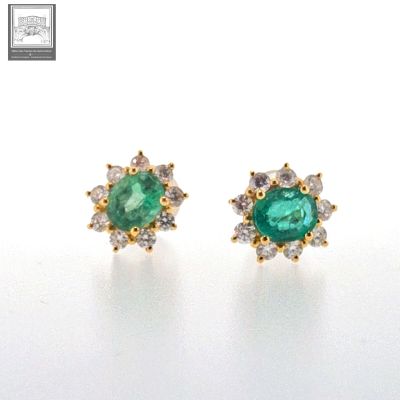 an image of a pair of emerald and diamond earrings