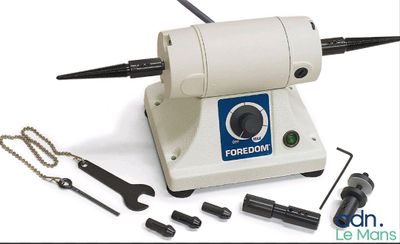 an image of a small electric polisher with tools