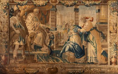 une tapisserie sur laquelle figurent un homme et une femme