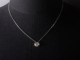 a close up of a necklace on a mannequin mannequin mannequin mannequin mannequin mannequin mannequin mannequin