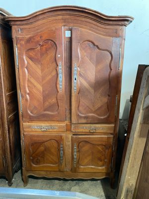 Armoire quatre portes deux tiroirs