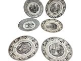 six assiettes ornées de motifs en noir et blanc sur un fond blanc
