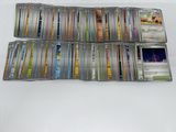 the cards are stacked up on a white surface