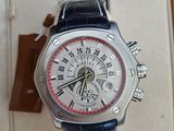 a watch that is in a box on the table