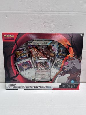 La boîte du jeu de cartes Pokémon comporte l'image d'un dragon.