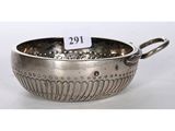 a silver plated bowl with handles and handles on a white background
