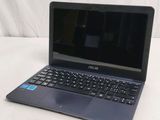 a laptop computer that is sitting on a table