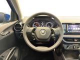 the interior of a car with a steering wheel and dashboard controls
