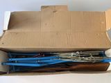 a cardboard box with a bunch of tools inside of it
