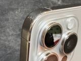 a close up of a cell phone with a camera attached to it