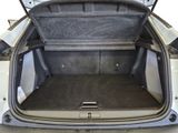 a trunk of a car with the back door open