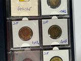 six different coins in a display case with labels on them