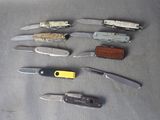 many different types of knives that are on the table