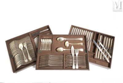 a set of silverware in a wooden box on a white background
