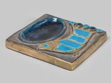an image of a blue and gold ashtray