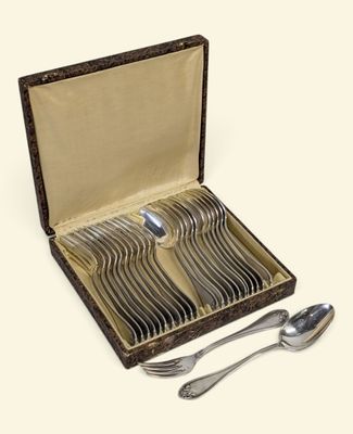 a box with a set of silver spoons and spoons in it