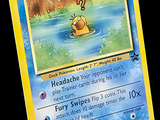 une carte Pokémon sur laquelle figure un canard dans l'eau