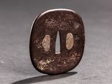 a close up of a small metal object on a table