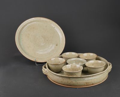 a bowl and a plate that are sitting on a table