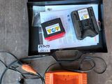 a box with a charger and a battery in it