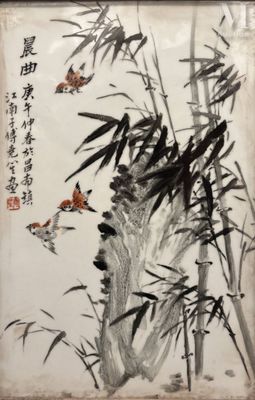 une image représentant un tableau représentant des oiseaux et des bambous, dans un cadre
