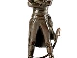 bronze statue of a man with a hat and a sword