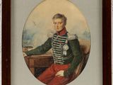 portrait of a young man in a military uniform sitting at a desk