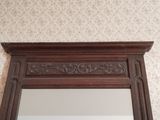 a mirror on the wall above a mirror in a room