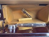 a suitcase that is sitting in the back of a car