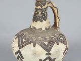 an image of a vase with a design on it