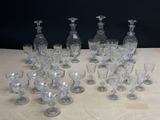 a lot of empty wine glasses sitting on a table