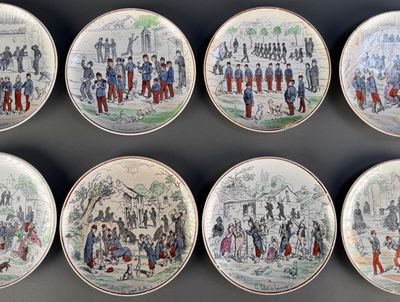 six plates with a picture of a group of people on them
