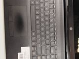 a laptop computer sitting on top of a desk with a mouse