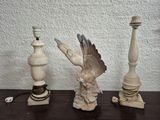 three candles that are sitting on a table