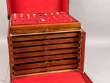 a wooden box with a red cover on top of it