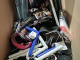 a cardboard box filled with assorted household items