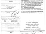 un gros plan d'un document sur lequel figure la photo d'une personne