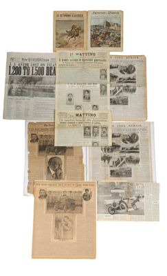 a lot of old newspapers on a white surface