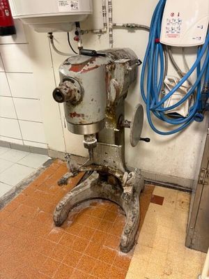 a machine that is sitting in the corner of a room