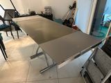 a table that is sitting in the middle of a room