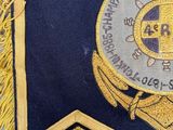 an image of a close up of a badge on a blue cloth