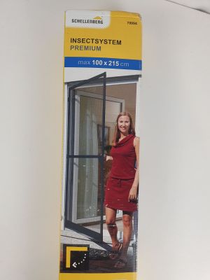 an image of a woman in a red dress standing in front of a glass door