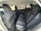 the back seats of a car are empty with no one in it