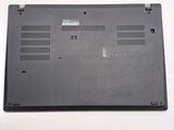 a close up of a laptop on a white surface