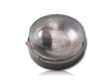a close up of a light on a white surface