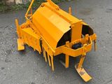 a close up of a machine that is sitting on the ground