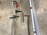 a lot of tools that are laying out on the floor