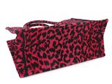 red and black leopard print travel bag on a white background