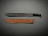 an image of a knife and a sheath on a table