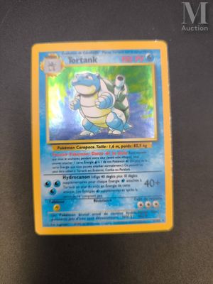 a close up of a pokemon card sitting on top of a table